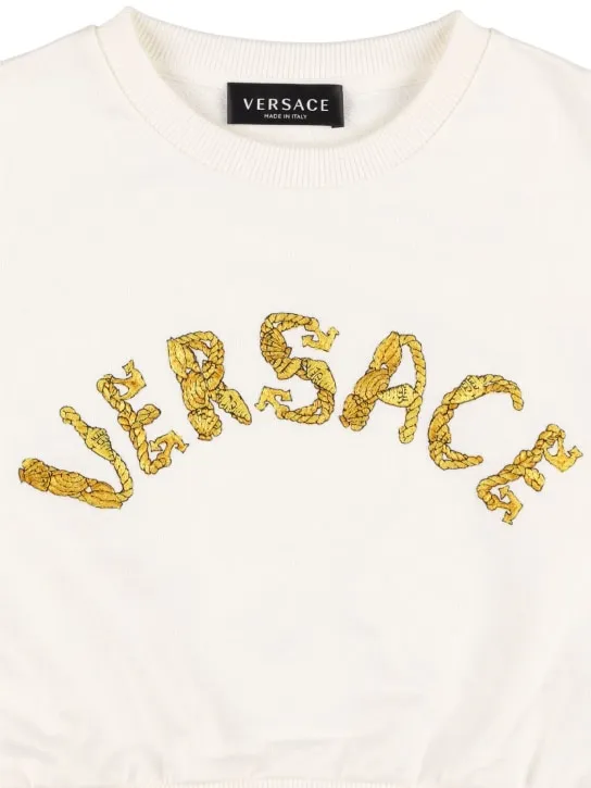 Versace   Cropped cotton sweatshirt w/ logo 